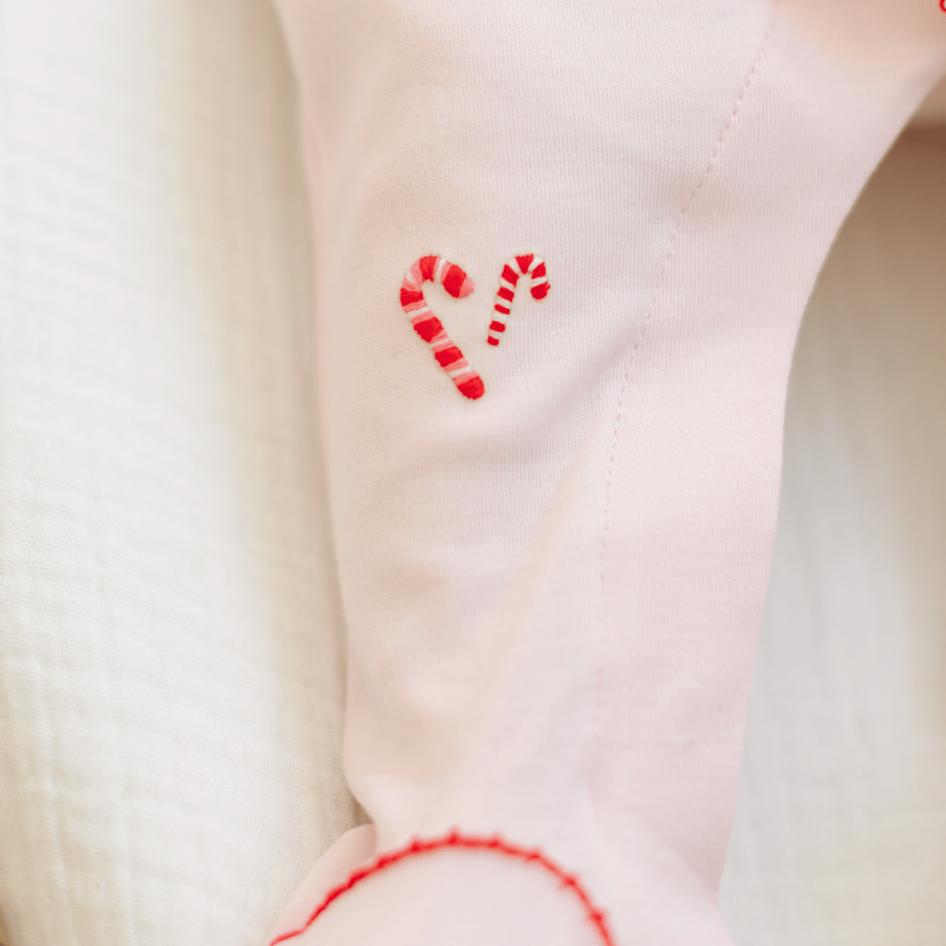 Candy Cane Lane Embroidered Ruffle Footie - Magnolia BabyFootie