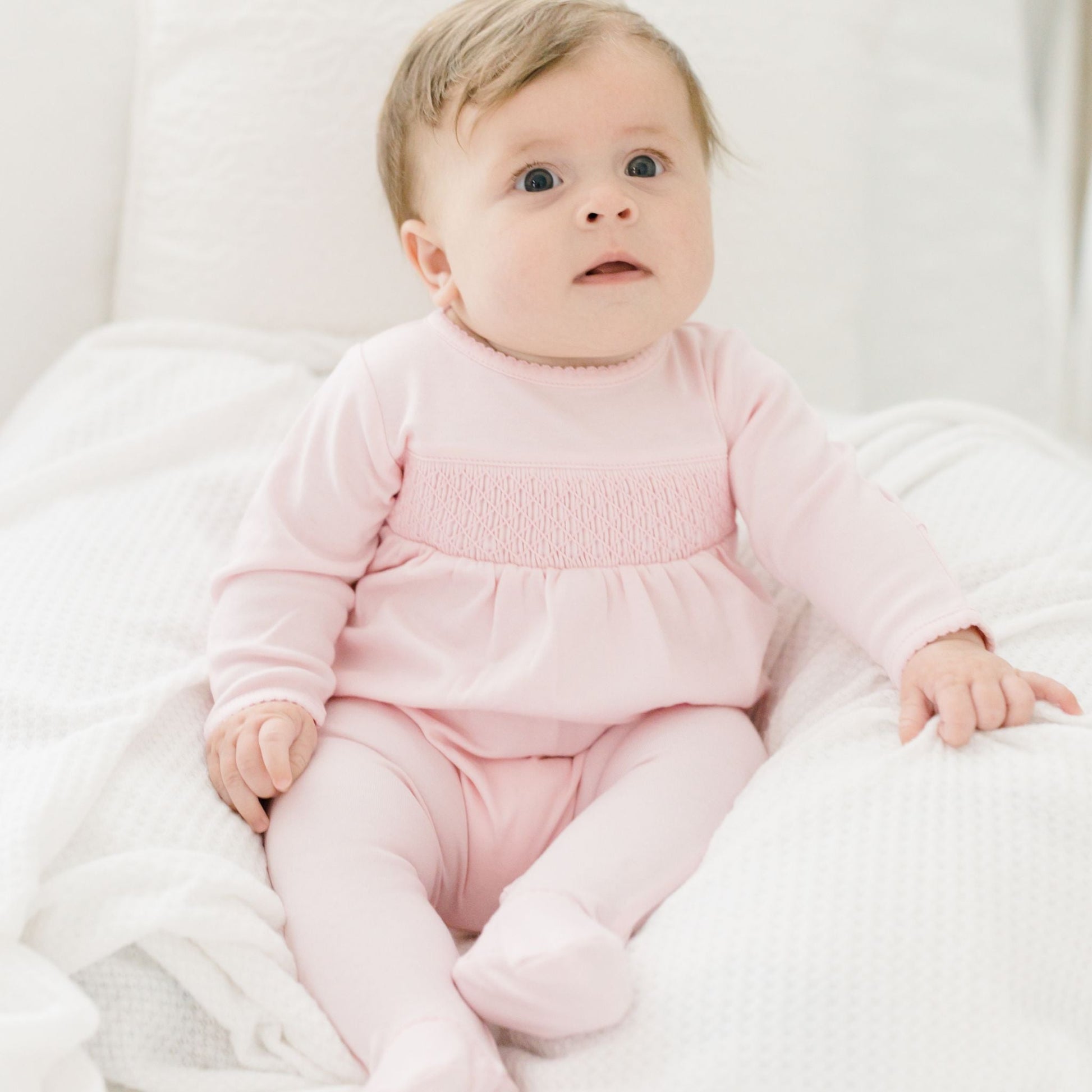 Essentials Solid Pink Smocked Footie - Magnolia BabyFootie