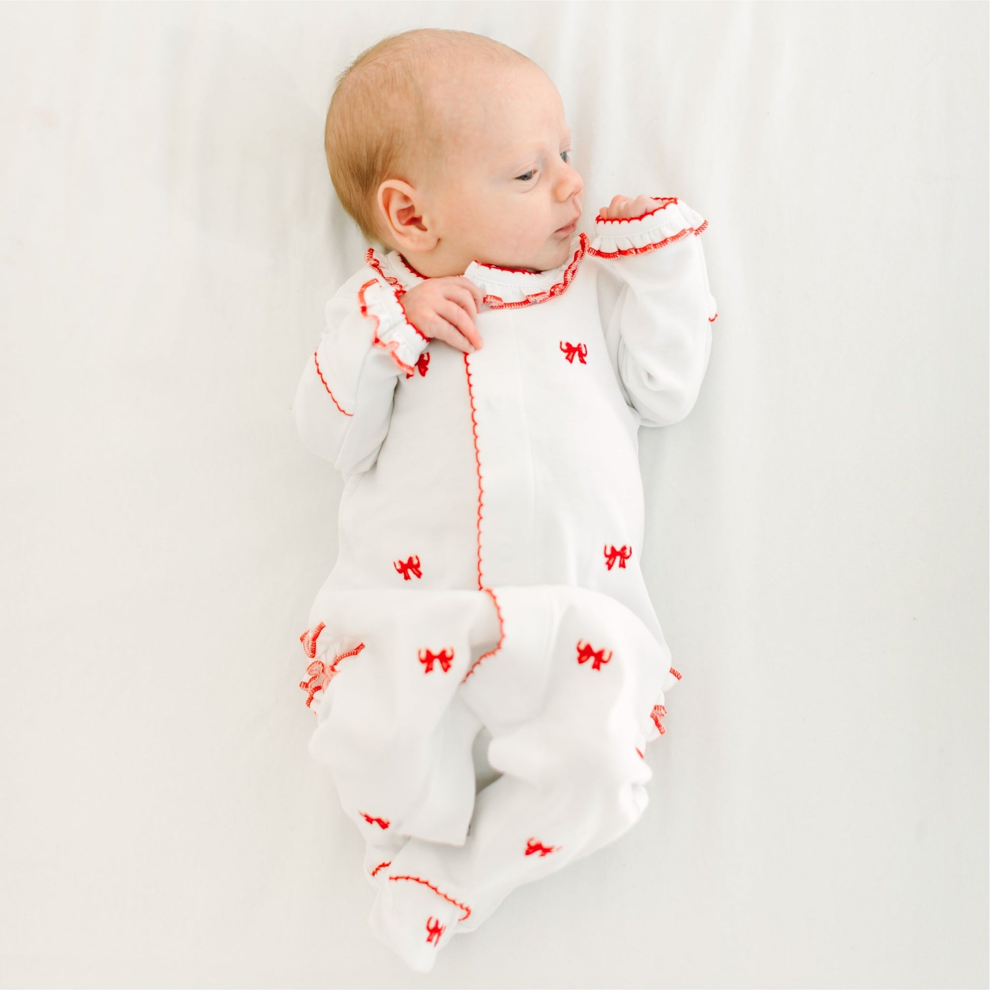 Scarlett Bows Scattered Ruffle Footie - Magnolia BabyFootie