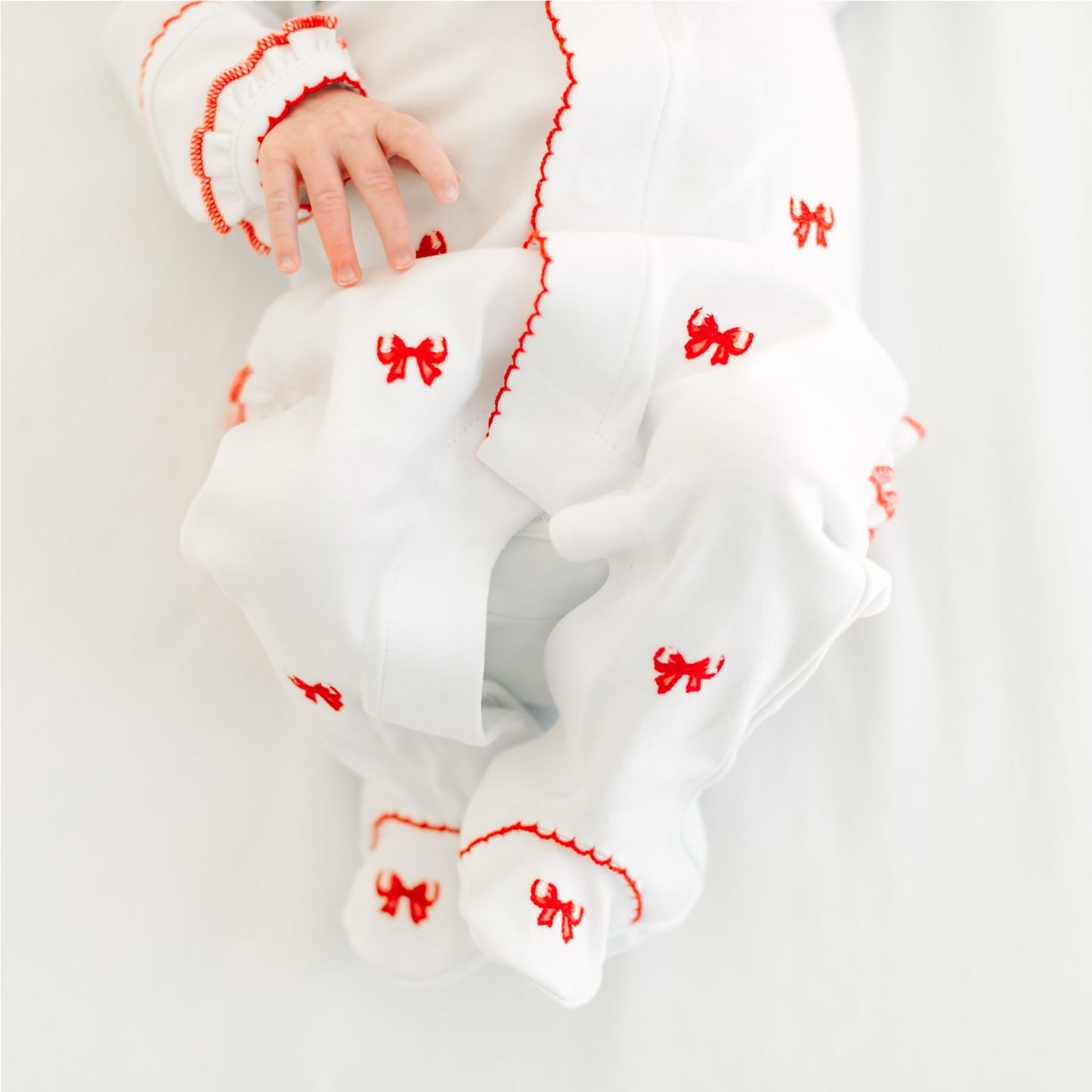 Scarlett Bows Scattered Ruffle Footie - Magnolia BabyFootie