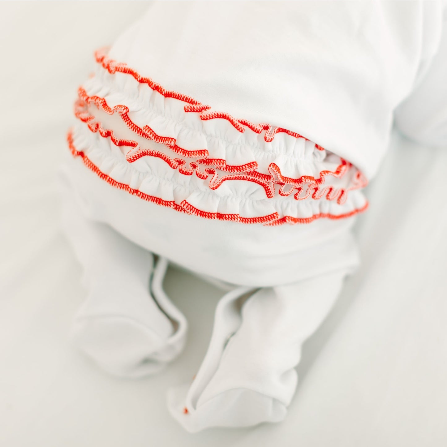 Scarlett Bows Scattered Ruffle Footie - Magnolia BabyFootie