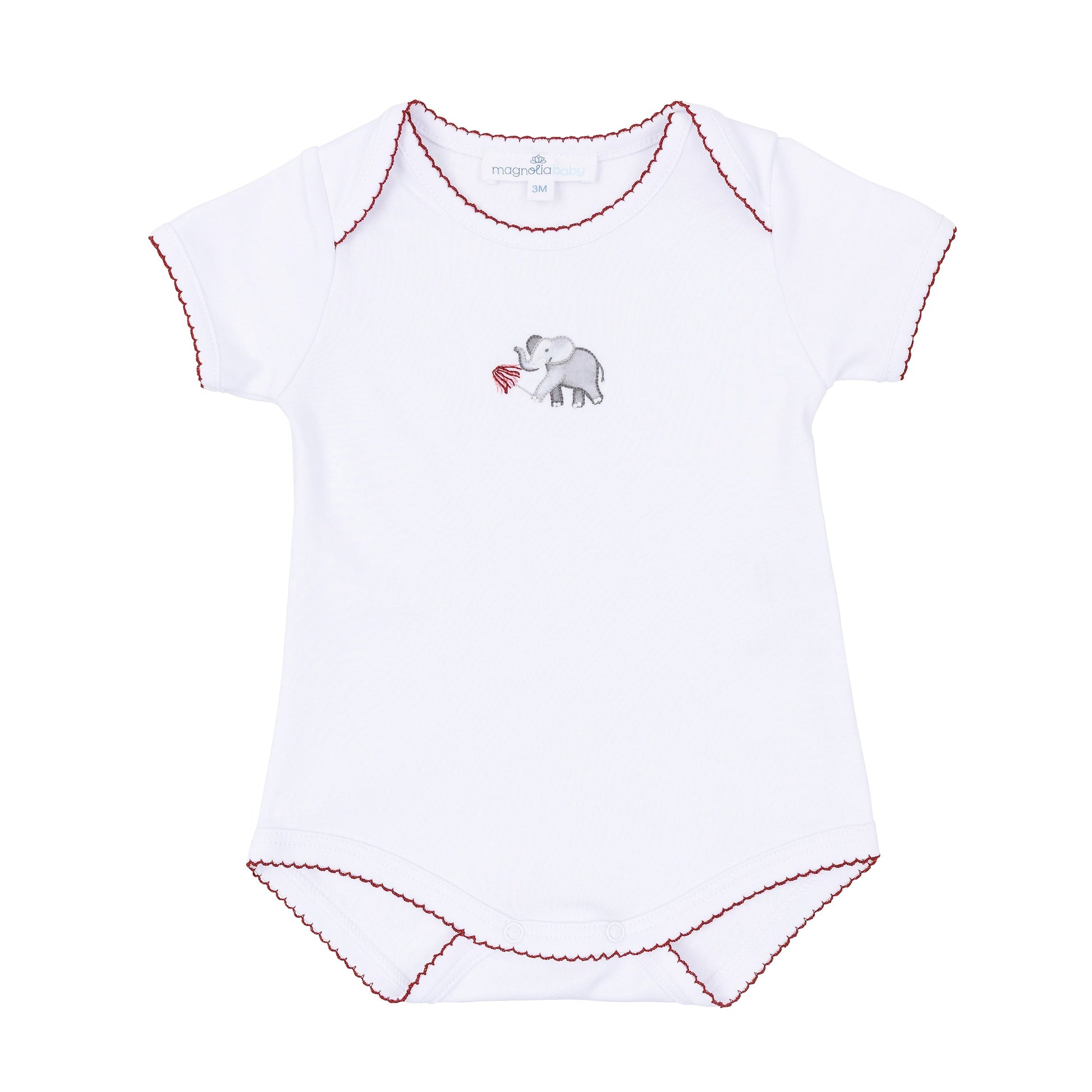 White short-sleeve baby bodysuit with deep crimson scalloped trim and embroidered elephant holding a pom detail.