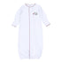 White long-sleeve baby converter gown with deep crimson scalloped trim, front opening, gathered bottom, and embroidered elephant holding a pom detail.