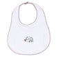 White baby bib with deep crimson scalloped trim and embroidered elephant holding a pom detail.