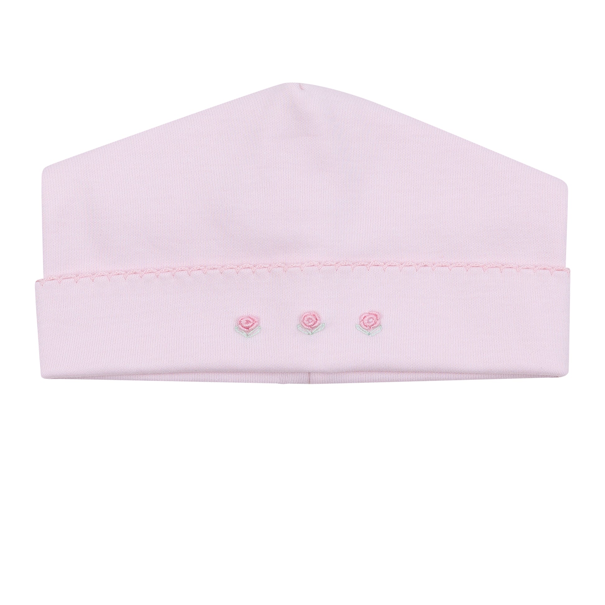 Pink hat with three small pink flowers on a white background