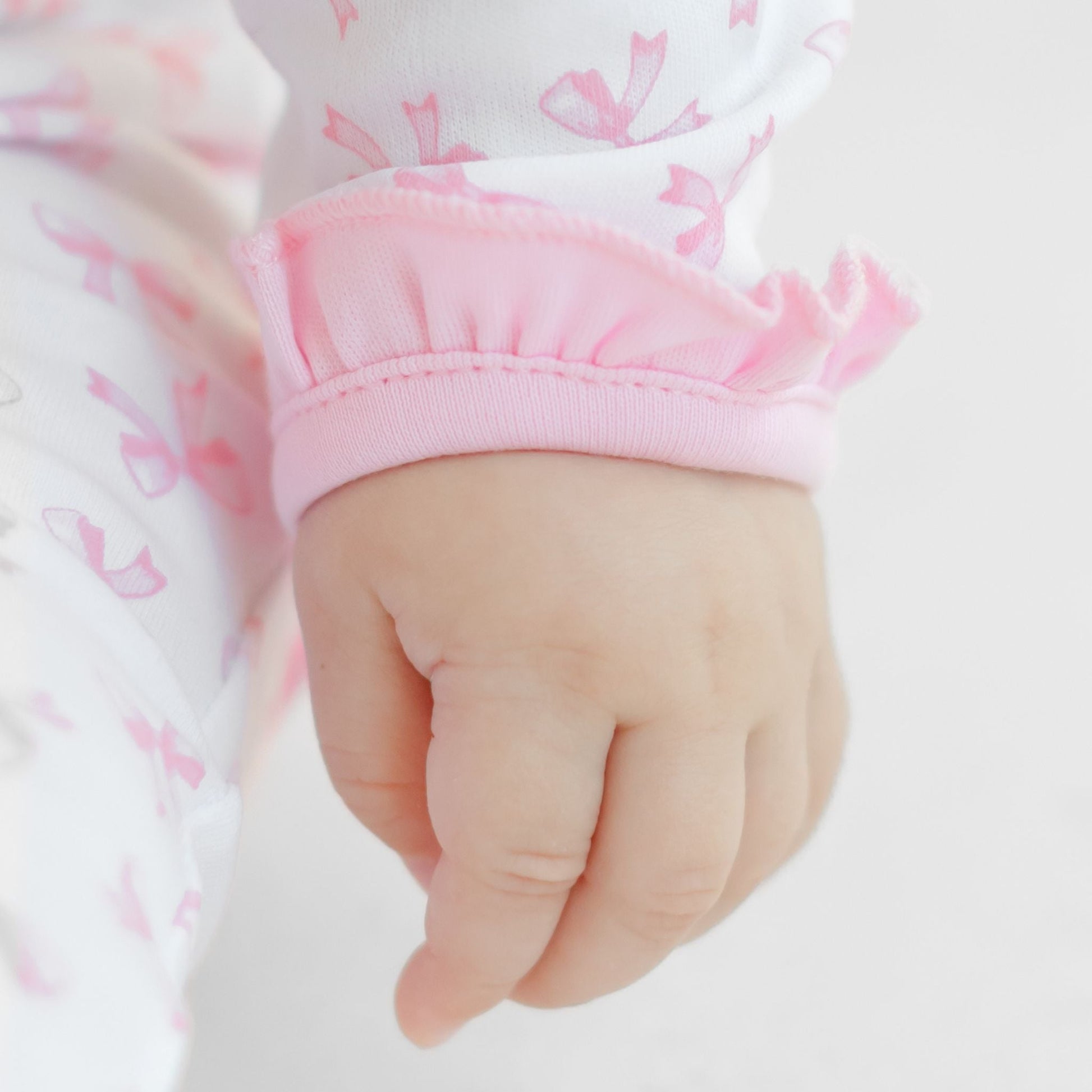 Baby Bows Print Ruffle Footie - Magnolia BabyFootie