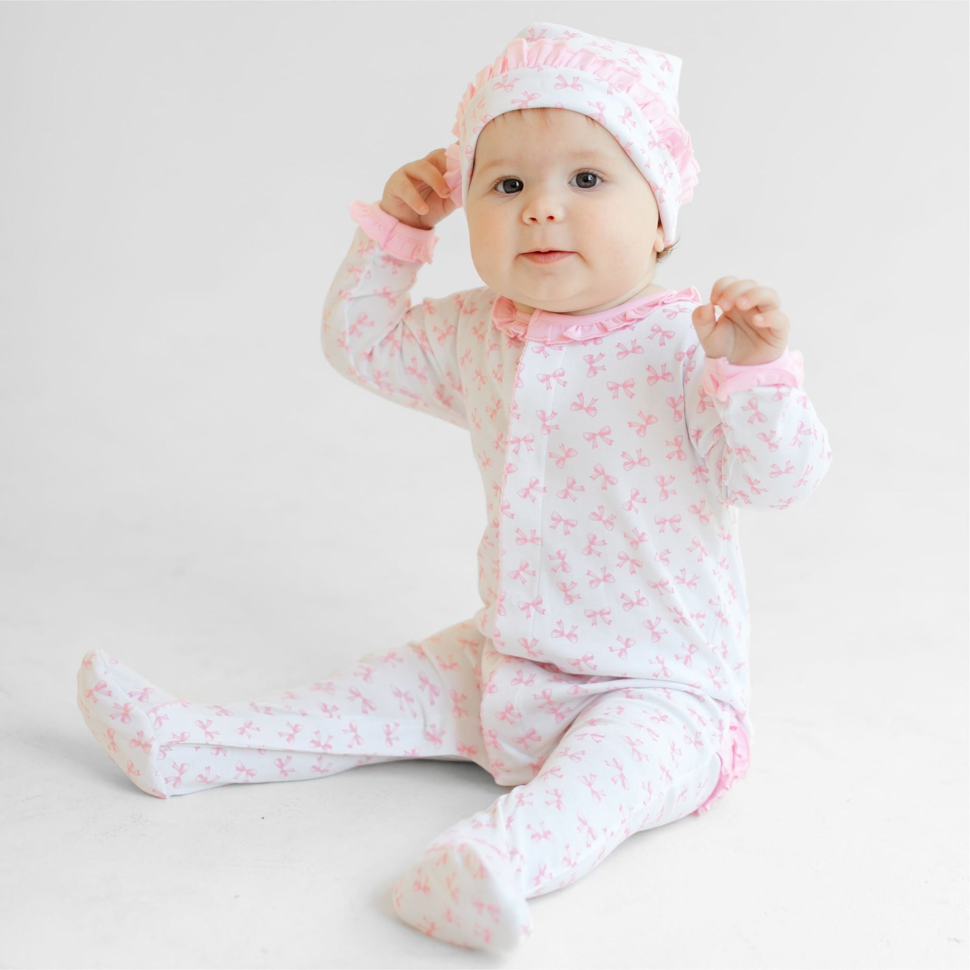Baby Bows Print Ruffle Footie - Magnolia BabyFootie