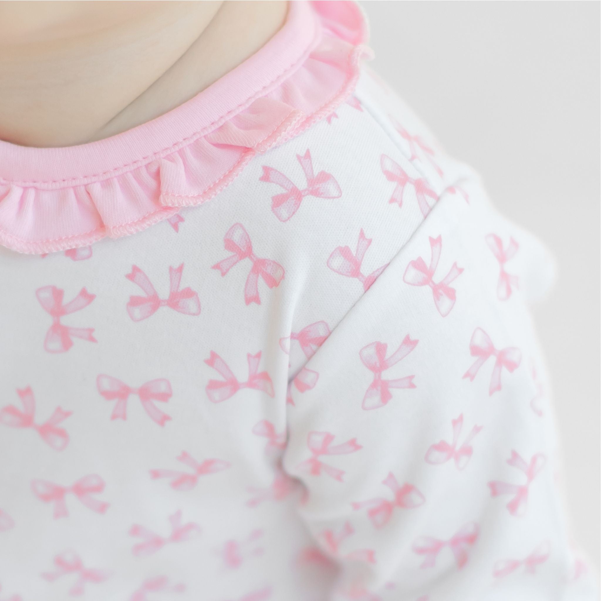 Baby Bows Print Ruffle Footie - Magnolia BabyFootie