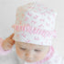 Baby Bows Print Ruffle Hat - Magnolia BabyHat
