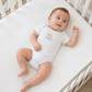 Magnolia Baby_Baby's First Hanukkah Hand-Embroidered Bodysuit_1