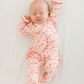 Candy Cane Lane Print Ruffle Zip Footie - Magnolia BabyFootie