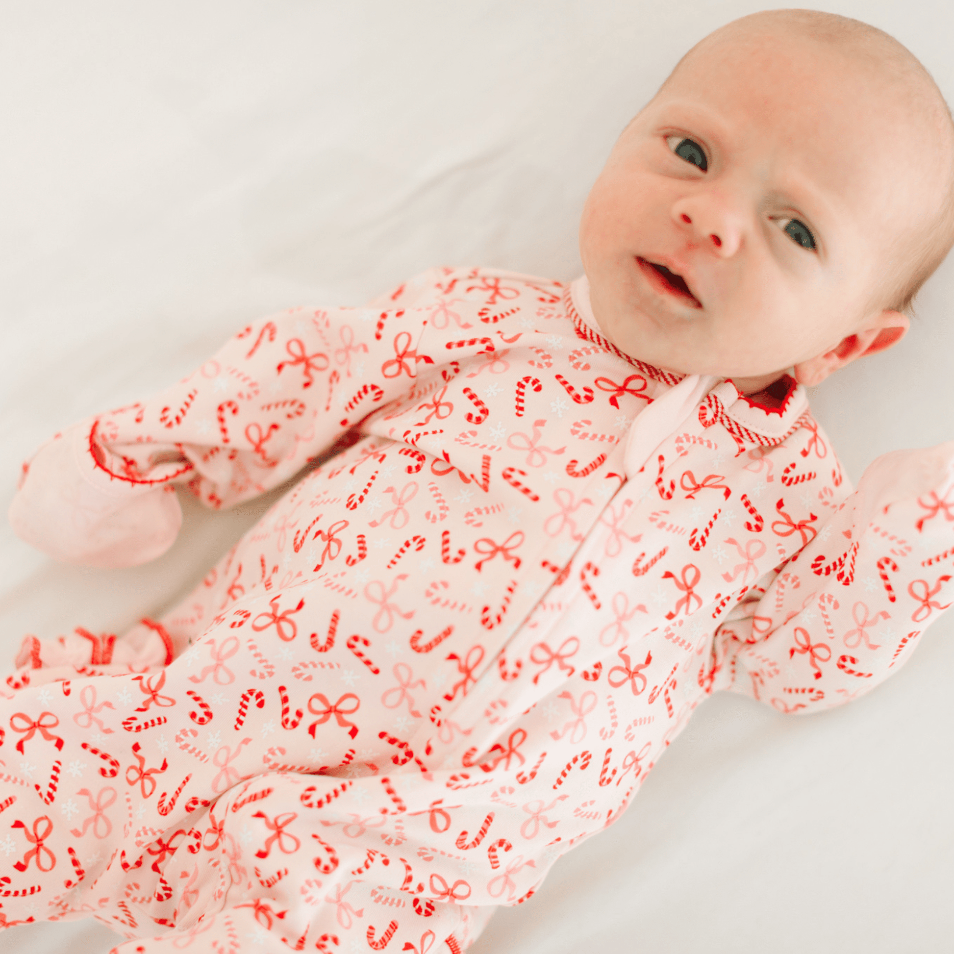 Candy Cane Lane Print Ruffle Zip Footie - Magnolia BabyFootie