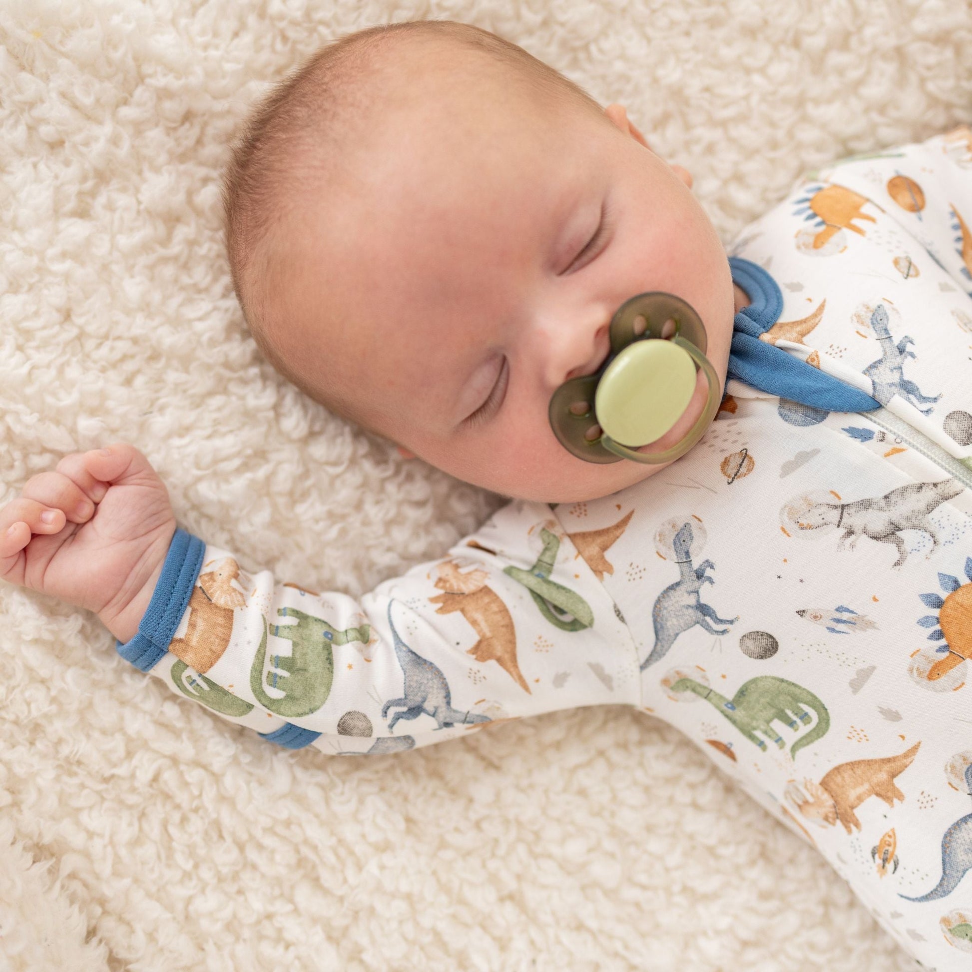Cosmic Dinos Zip Footie - Cobalt Blue - Magnolia BabyFootie