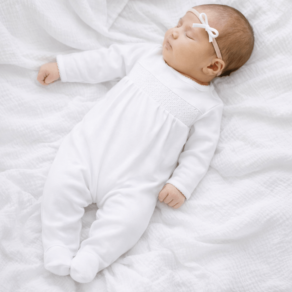 Essentials Smocked White Footie with White Trim - Magnolia BabyFootie
