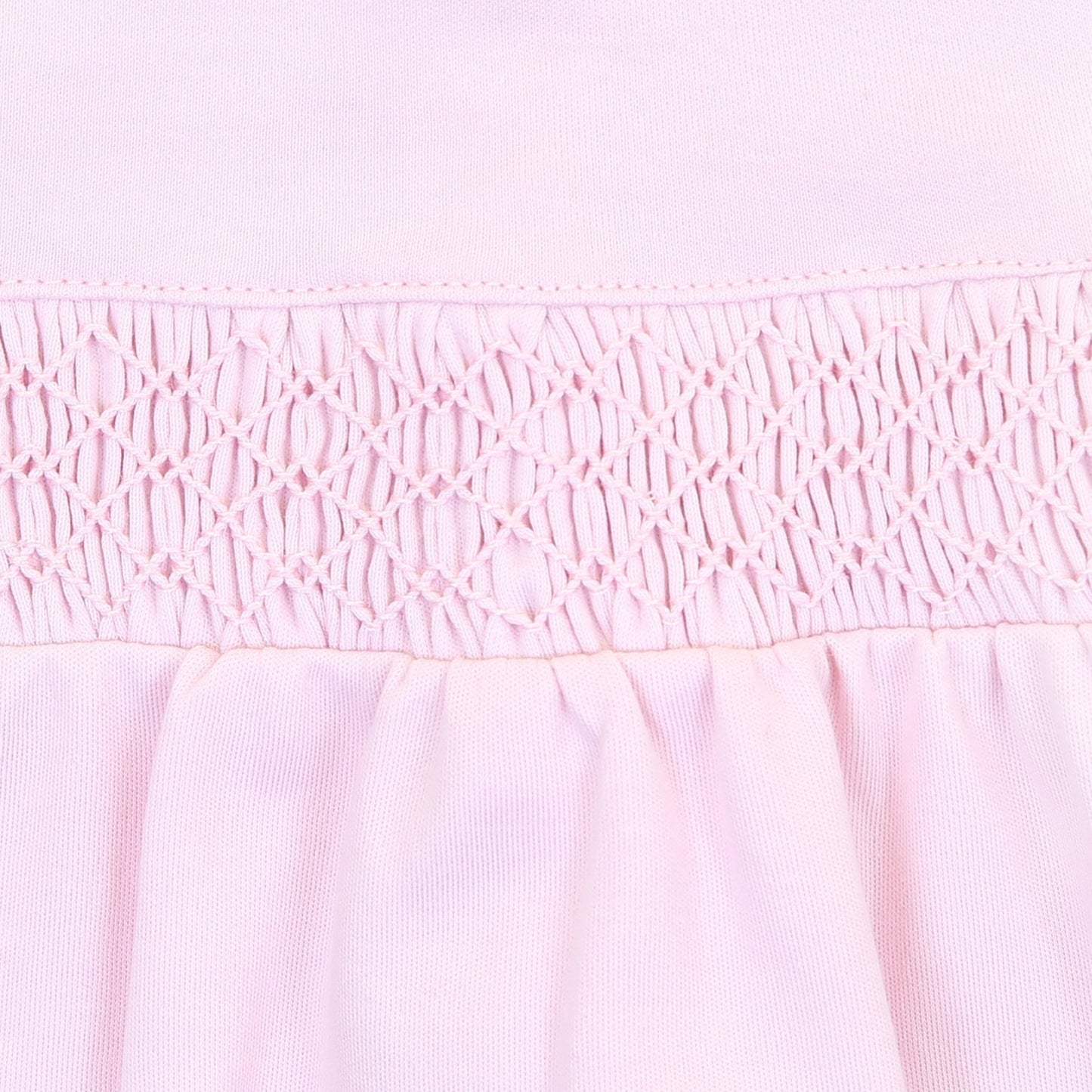 Essentials Solid Pink Smocked Footie - Magnolia BabyFootie