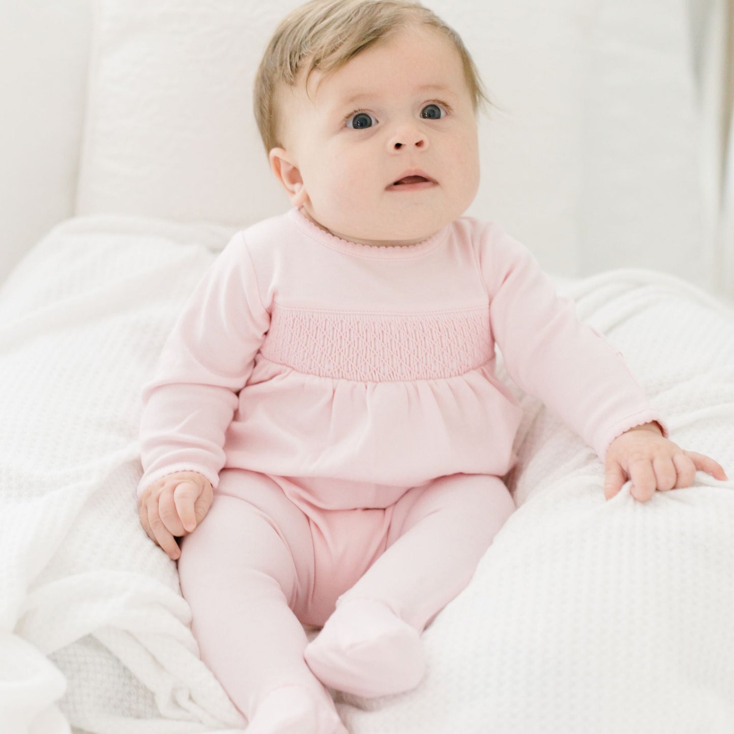 Essentials Solid Pink Smocked Footie - Magnolia BabyFootie