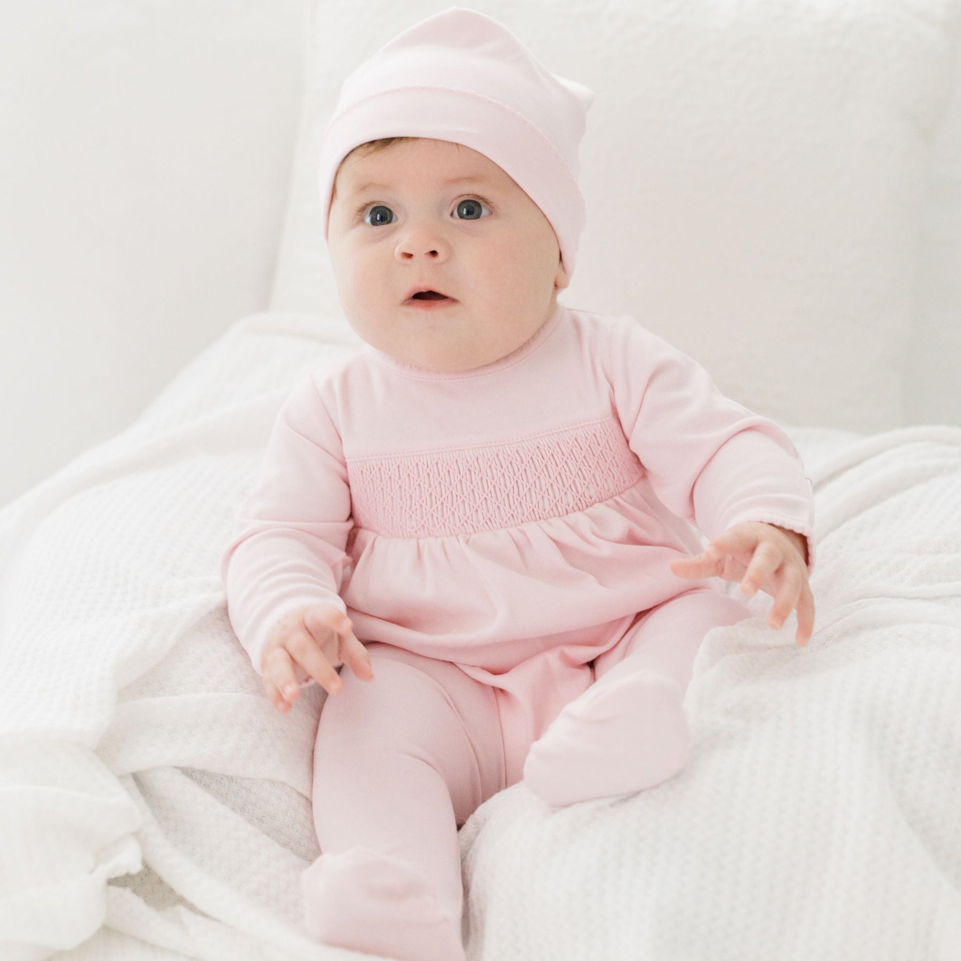 Essentials Solid Pink Smocked Footie - Magnolia BabyFootie