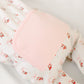 Jolly Ribbons Print Ruffle Zip Footie