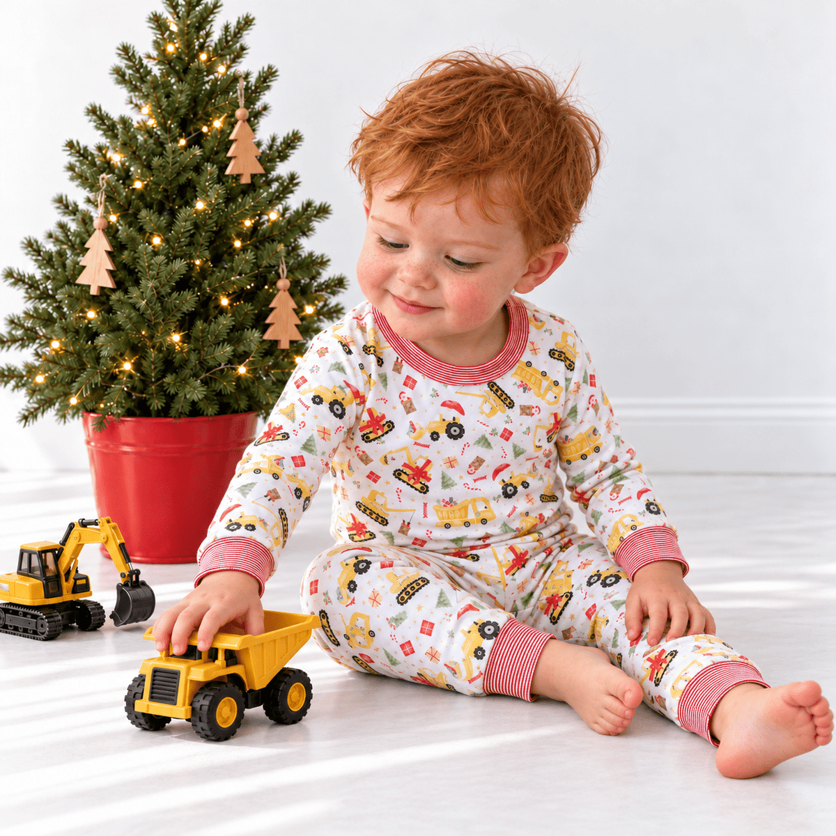 Magnolia Baby_Santa's Construction Crew Long Pajamas_1