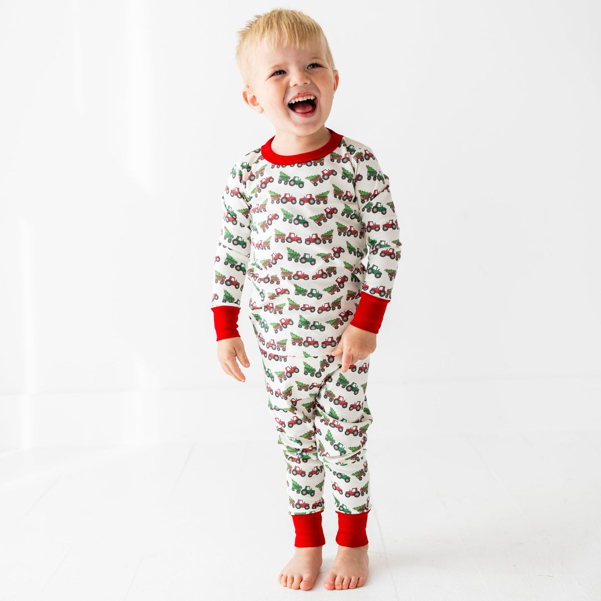 Luna and Arlo_Santa's Tractor Long Pajamas_1