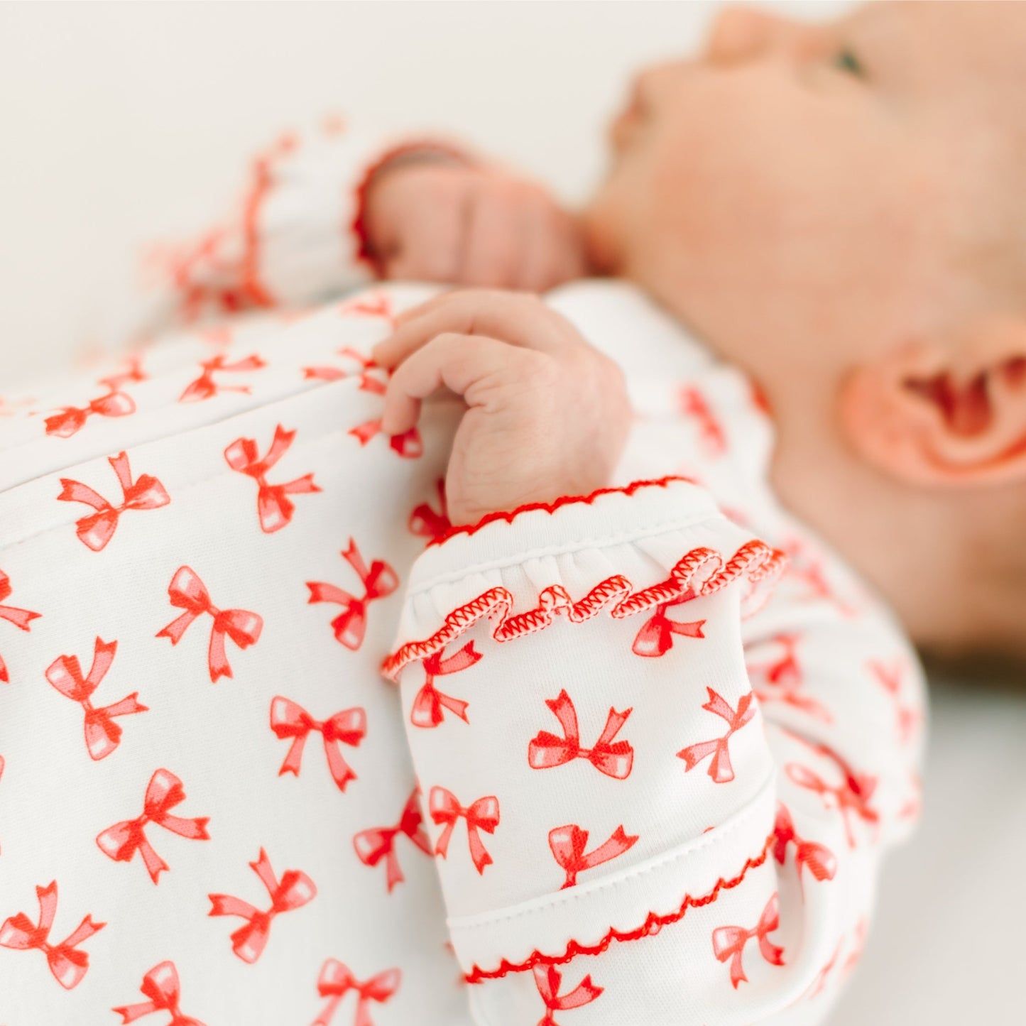 Scarlett Bows Print Zip Footie - Magnolia BabyFootie