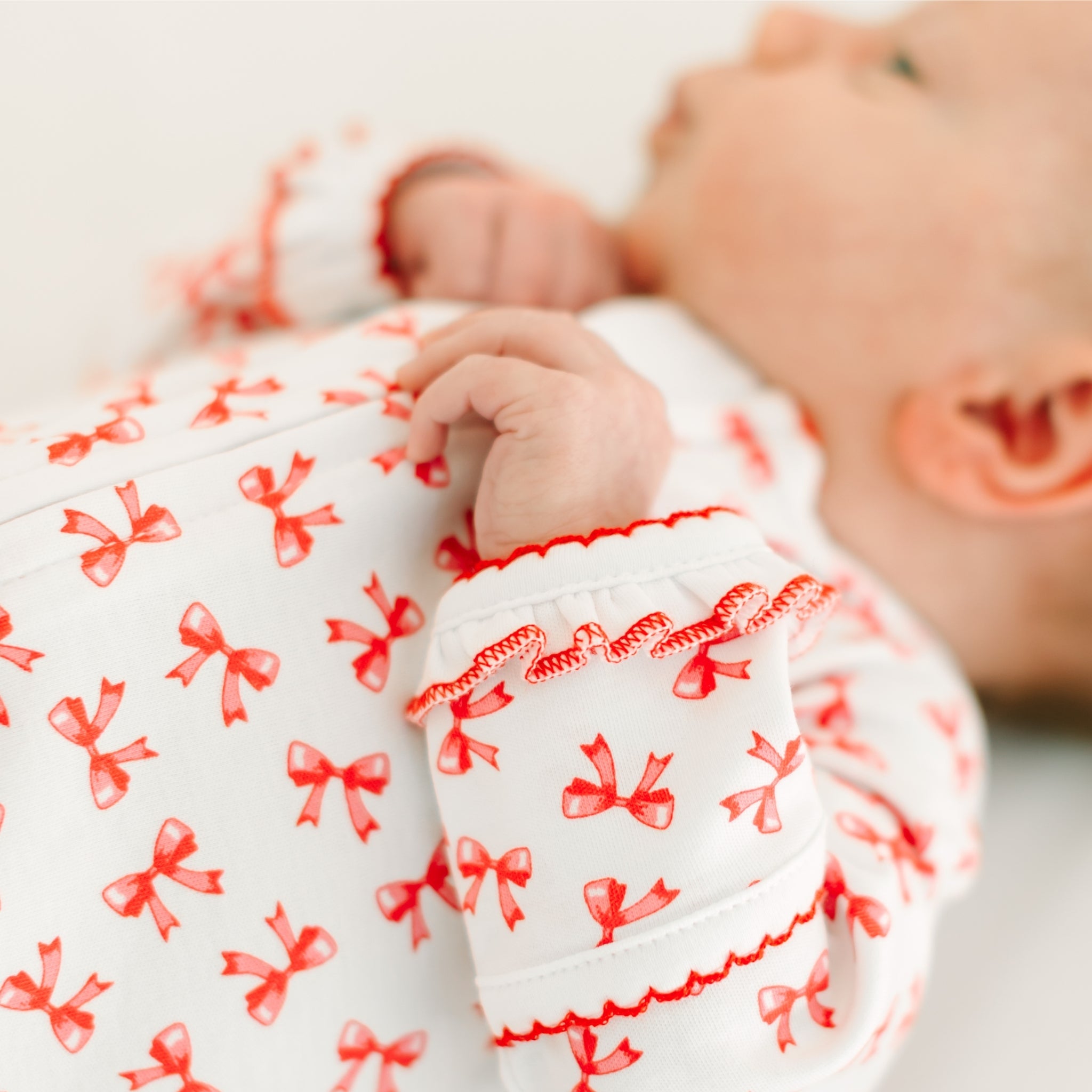 Scarlett Bows Print Zip Footie - Magnolia BabyFootie