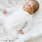 Solid Essentials White Smocked Footie - Magnolia BabyFootie
