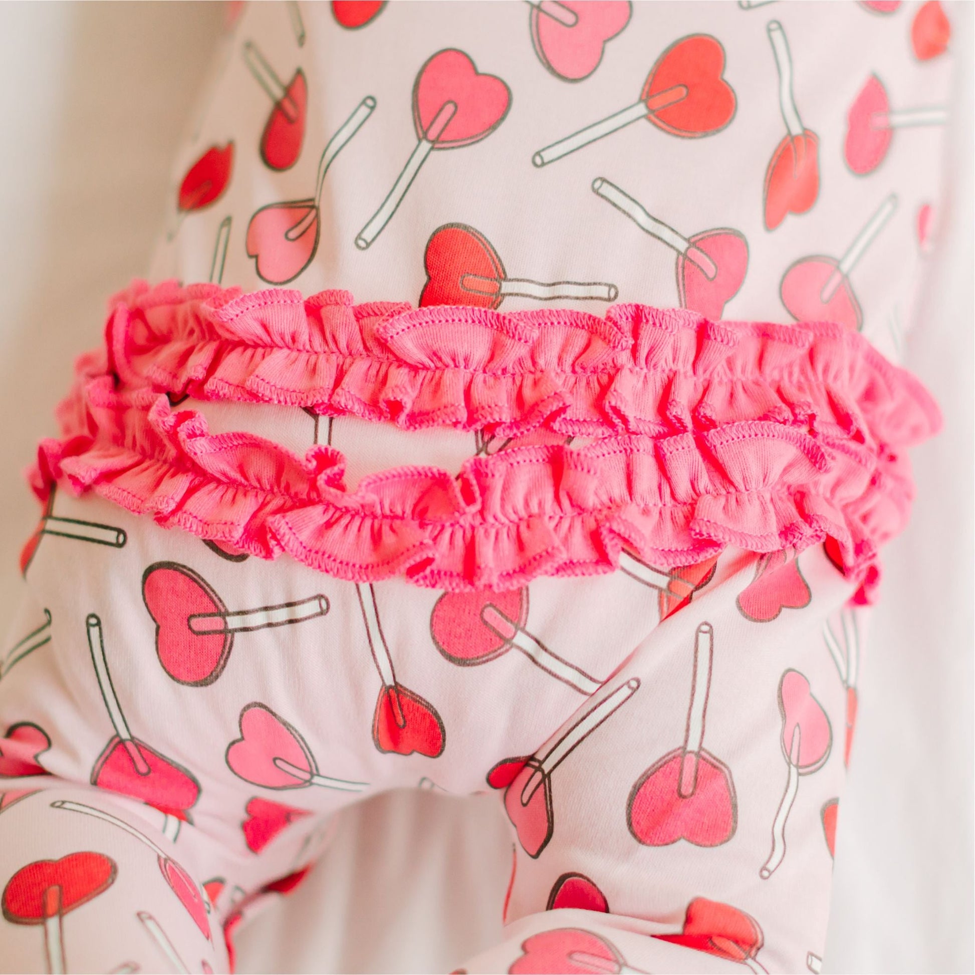 Sweetheart Pops Ruffle Zip Footie - Magnolia BabyFootie