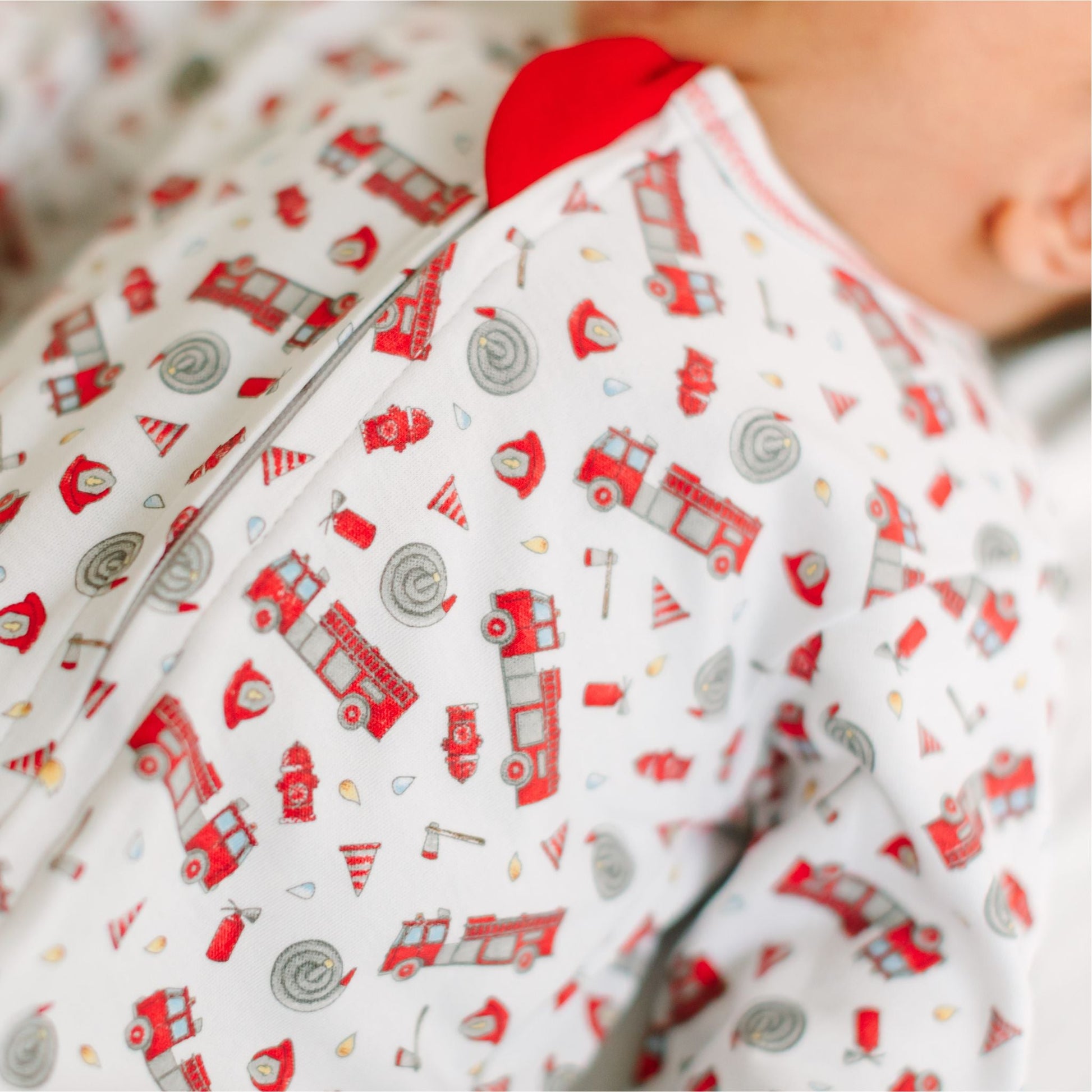 To the Rescue Print Zip Footie - Magnolia BabyFootie