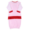 Vestido de vuelta rosa con volantes y apliques de Papá Noel que guiñan un ojo